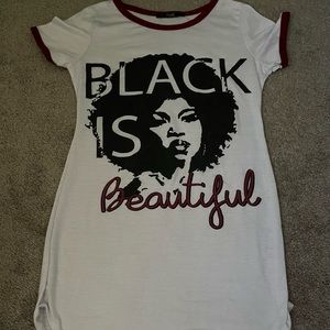 T-shirt reading "Black Is Beautiful"